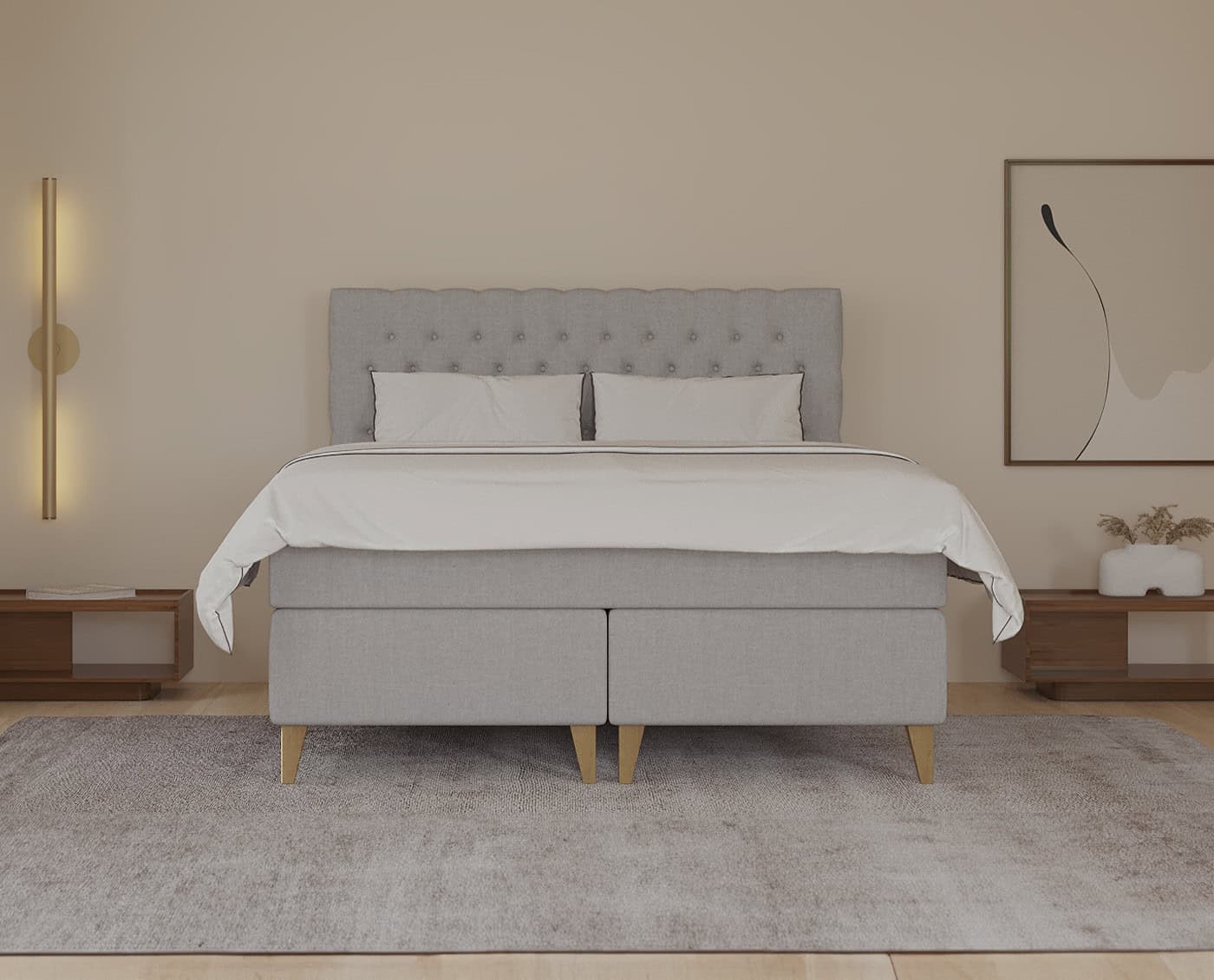 Eksklusivt sengeramme i lys gråt med elegant tufting, perfekt til moderne soveværelser, specialfremstillet af SengeSnedkeren.