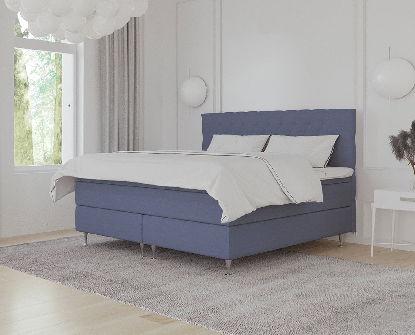 Elegantt dansk skræddersyet seng med blå polstret hovedgærde, moderne design, perfekt til soveværelser, speciallavet af SengeSnedkeren.